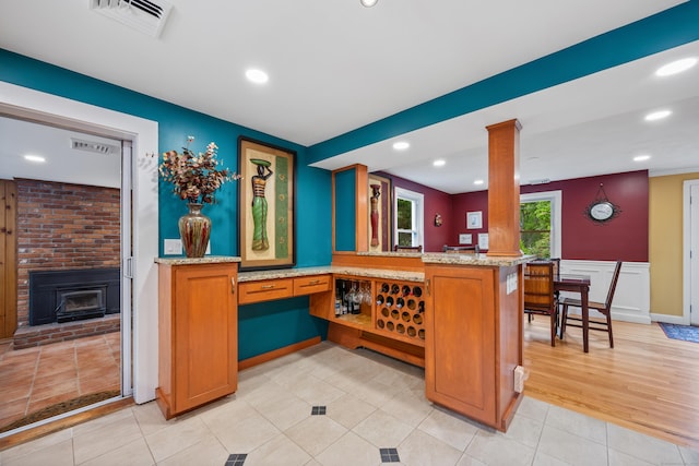 1 Russell Ln, Simsbury, CT 06070 - indoor bar with recessed lighting, ornate columns, and light tile patterned floors
