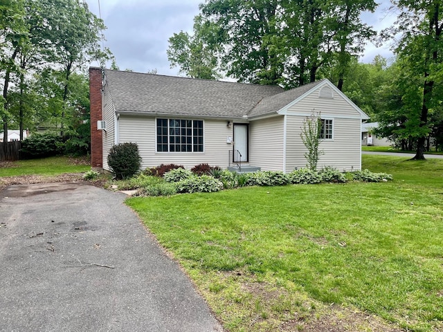 219 French St, Bristol, CT 06010 - single story home featuring a chimney, a front lawn, and a shingled roof