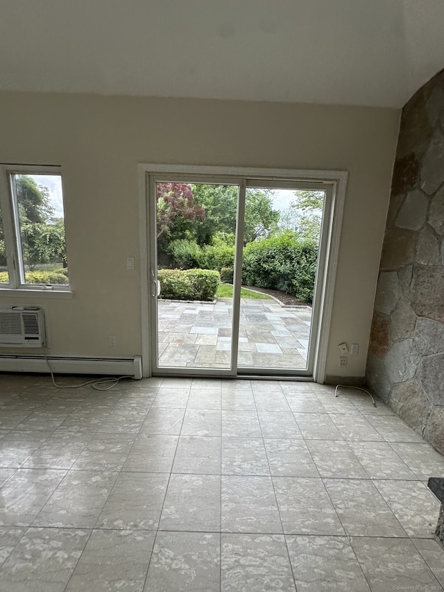16 Neponsit St, Stamford, CT 06902 - tiled spare room featuring a baseboard radiator, healthy amount of natural light, and an AC wall unit