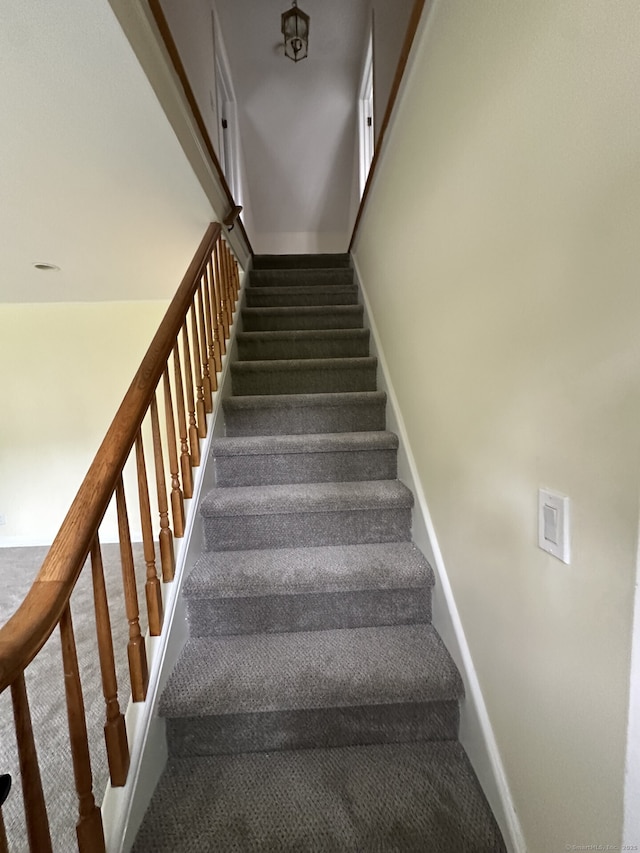 16 Neponsit St, Stamford, CT 06902 - stairway with carpet and baseboards