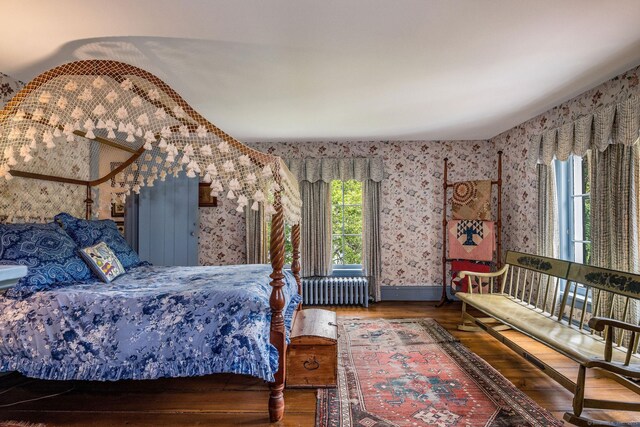 30 Meeting House Ln, Madison, CT 06443 - bedroom featuring wallpapered walls, radiator, and wood finished floors