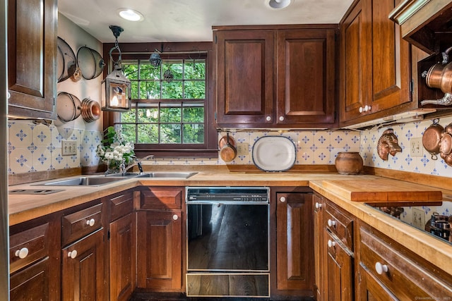30 Meeting House Ln, Madison, CT 06443 - kitchen with black appliances, wood counters, decorative backsplash, and a sink
