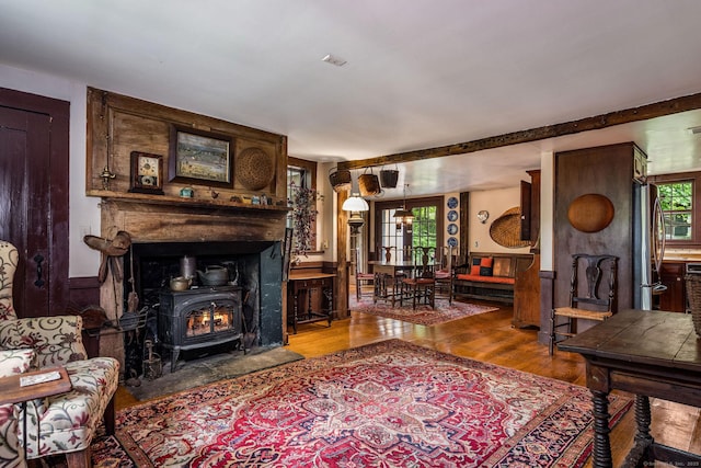 30 Meeting House Ln, Madison, CT 06443 - living room featuring wood finished floors and a wood stove