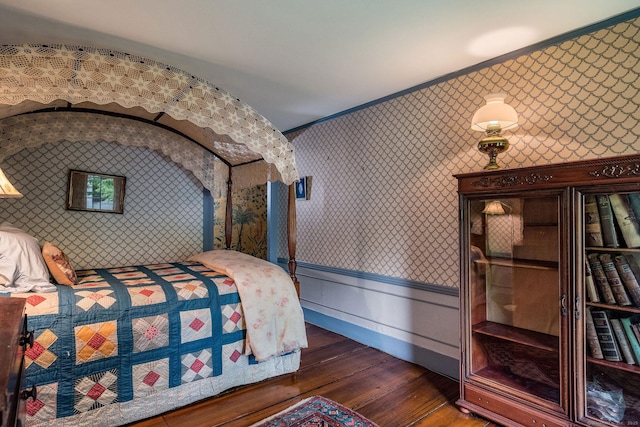 30 Meeting House Ln, Madison, CT 06443 - bedroom featuring wallpapered walls, wood-type flooring, a wainscoted wall, and ornamental molding