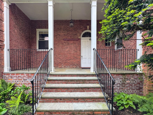 70 Strawberry Hill Ave Unit 5Gr4, Stamford, CT 06902 - view of exterior entry featuring brick siding and covered porch