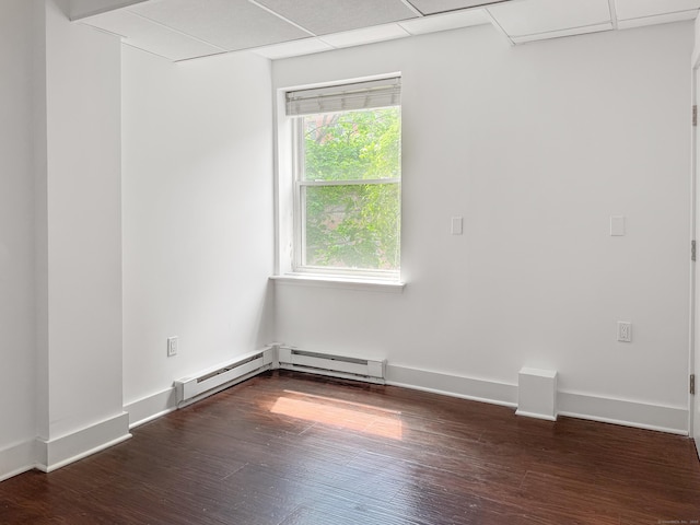 70 Strawberry Hill Ave Unit 5Gr4, Stamford, CT 06902 - empty room featuring wood finished floors, baseboards, and a drop ceiling