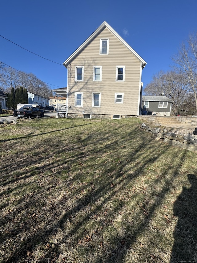 7 Carver Ave, Norwich, CT 06360 - back of house with a yard