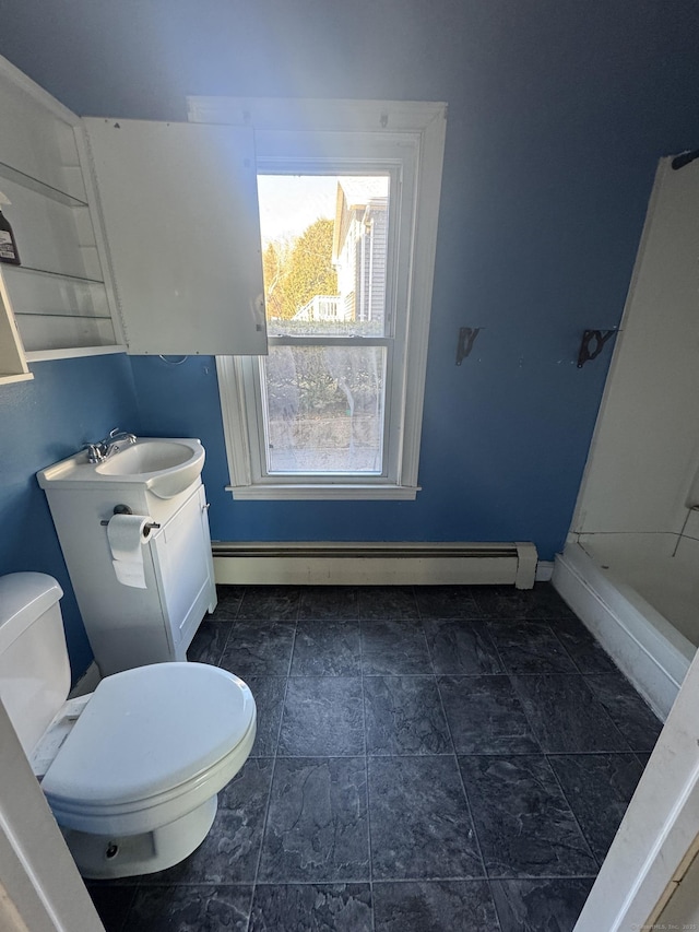 7 Carver Ave, Norwich, CT 06360 - bathroom featuring a baseboard heating unit, toilet, vanity, baseboards, and a shower