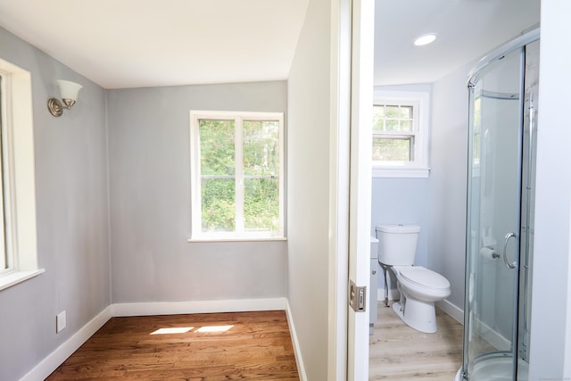 314 Skiff St, North Haven, CT 06473 - full bath featuring wood finished floors, toilet, a shower stall, baseboards, and recessed lighting