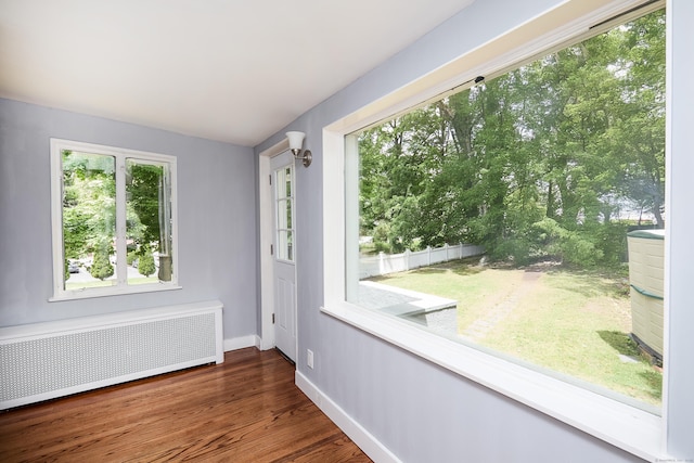 314 Skiff St, North Haven, CT 06473 - empty room with radiator, baseboards, and wood finished floors
