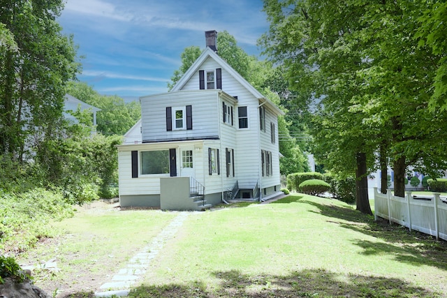 314 Skiff St, North Haven, CT 06473 - view of front of home with a chimney
