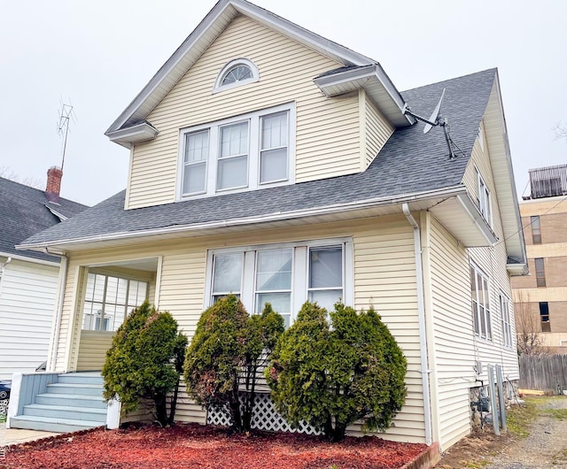 26 Stoehrs Pl, Bridgeport, CT 06606 - view of side of home with roof with shingles