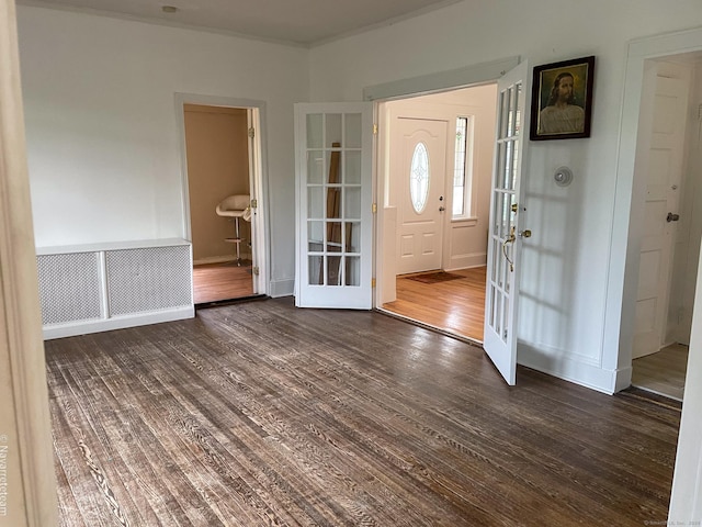 26 Stoehrs Pl, Bridgeport, CT 06606 - foyer with dark wood-style floors and french doors