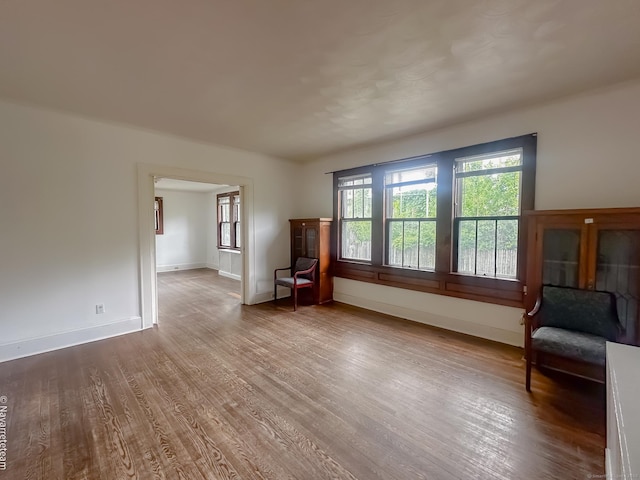 26 Stoehrs Pl, Bridgeport, CT 06606 - unfurnished room featuring wood finished floors, healthy amount of natural light, and baseboards