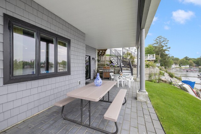 194 Killdeer Rd, Webster, MA 01570 - view of patio / terrace featuring stairs and outdoor dining area