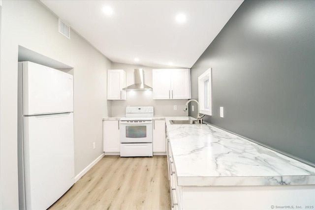 13 Turner Rd, Litchfield, CT 06778 - kitchen featuring white appliances, wall chimney exhaust hood, a sink, lofted ceiling, and white cabinets
