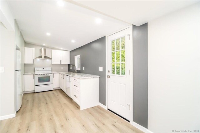 13 Turner Rd, Litchfield, CT 06778 - kitchen with white appliances, wall chimney exhaust hood, a sink, light wood finished floors, and white cabinetry