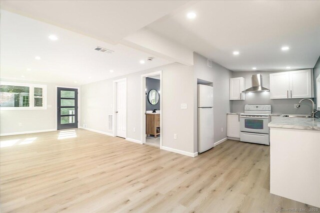 13 Turner Rd, Litchfield, CT 06778 - kitchen with white appliances, wall chimney range hood, a sink, light wood-style flooring, and recessed lighting
