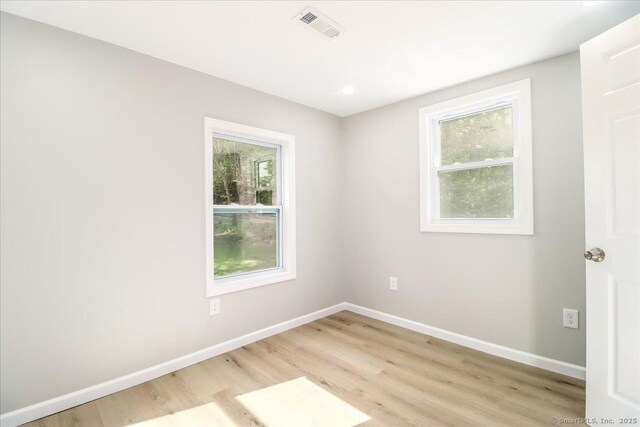13 Turner Rd, Litchfield, CT 06778 - unfurnished room with light wood-style flooring, plenty of natural light, and baseboards