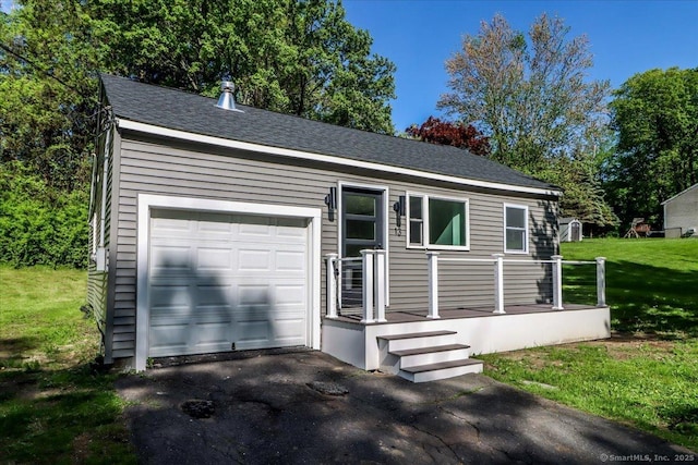 13 Turner Rd, Litchfield, CT 06778 - view of front of home featuring a front lawn, driveway, a garage, and a shingled roof