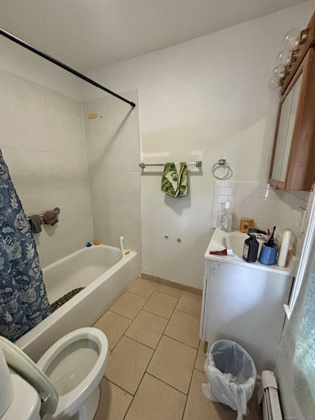 479 Broad St, Hartford, CT 06106 - full bath featuring shower / tub combo, tile patterned flooring, toilet, vanity, and tasteful backsplash