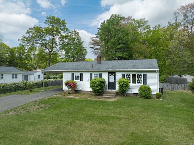 1 Pine Grove Ave, Enfield, CT 06082 - single story home with driveway, a chimney, a carport, and a shingled roof