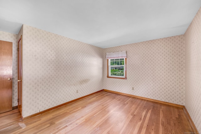 1 Pine Grove Ave, Enfield, CT 06082 - spare room featuring light wood finished floors and wallpapered walls