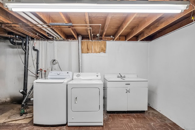 1 Pine Grove Ave, Enfield, CT 06082 - laundry area with separate washer and dryer, cabinet space, and dark flooring