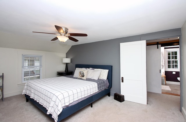 62 Mather St, Manchester, CT 06042 - carpeted bedroom with a ceiling fan, a barn door, lofted ceiling, and baseboards