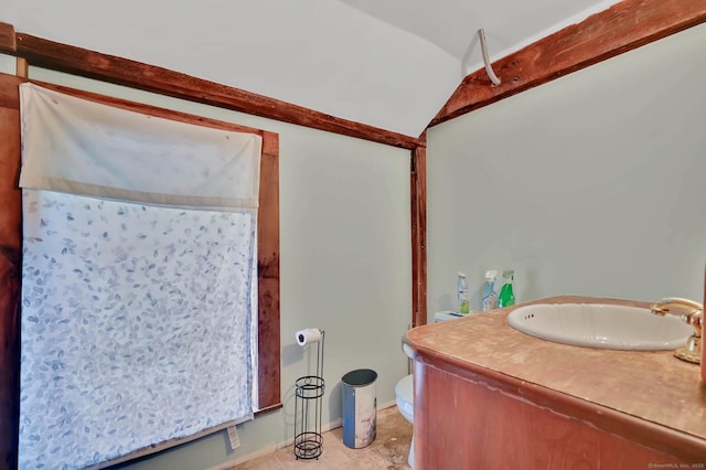 29 Walnut St, Winchester, CT 06098 - bathroom featuring vaulted ceiling, toilet, vanity, and tile patterned flooring