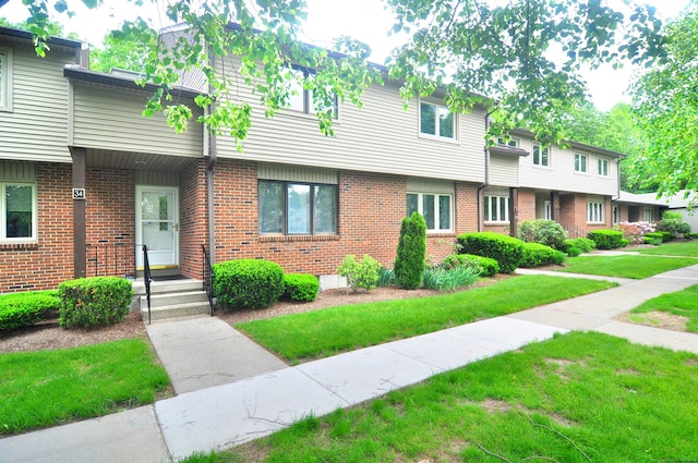 443 S Main St Unit 34, Manchester, CT 06040 - view of property with a front yard and brick siding
