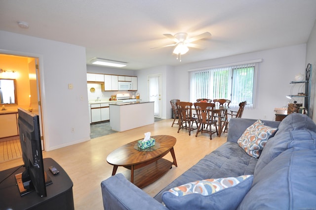 443 S Main St Unit 34, Manchester, CT 06040 - living area with a ceiling fan and light wood-style floors