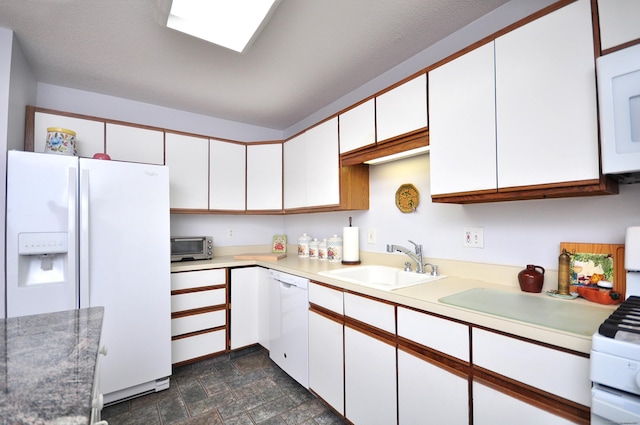 443 S Main St Unit 34, Manchester, CT 06040 - kitchen with white appliances, a sink, white cabinets, and light countertops