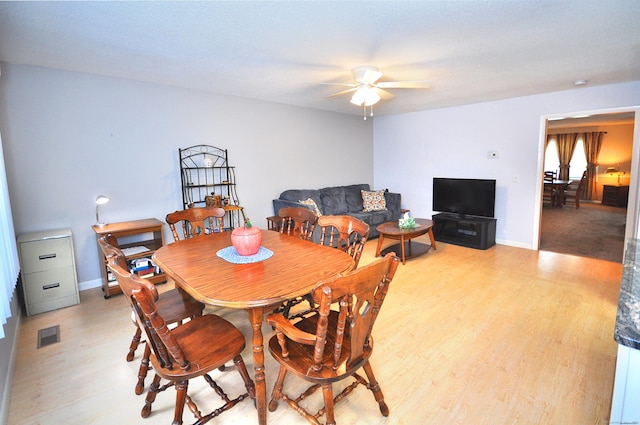 443 S Main St Unit 34, Manchester, CT 06040 - dining room with light wood finished floors, a ceiling fan, and baseboards