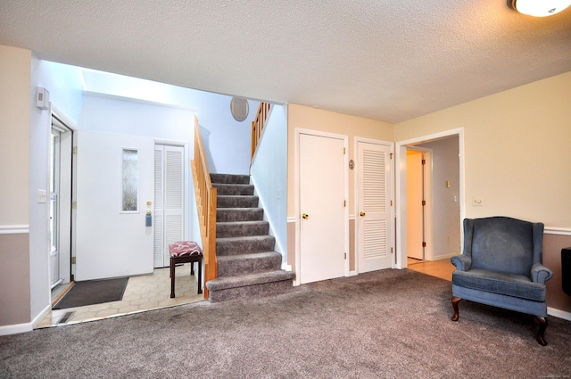 443 S Main St Unit 34, Manchester, CT 06040 - sitting room with stairway, carpet, and a textured ceiling
