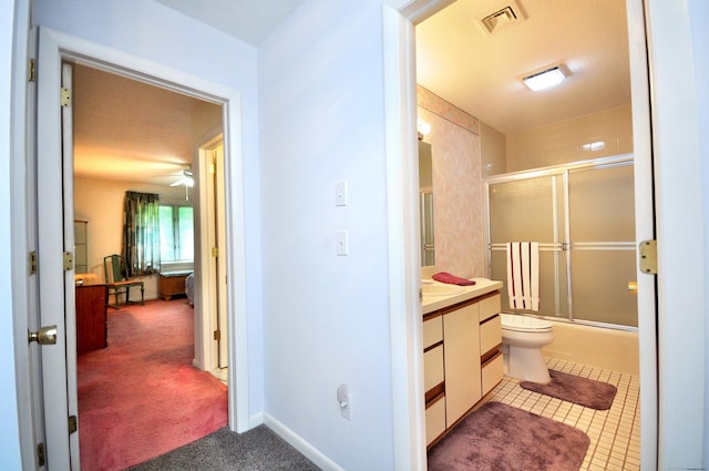 443 S Main St Unit 34, Manchester, CT 06040 - bathroom with vanity, toilet, shower / bath combination with glass door, and a ceiling fan