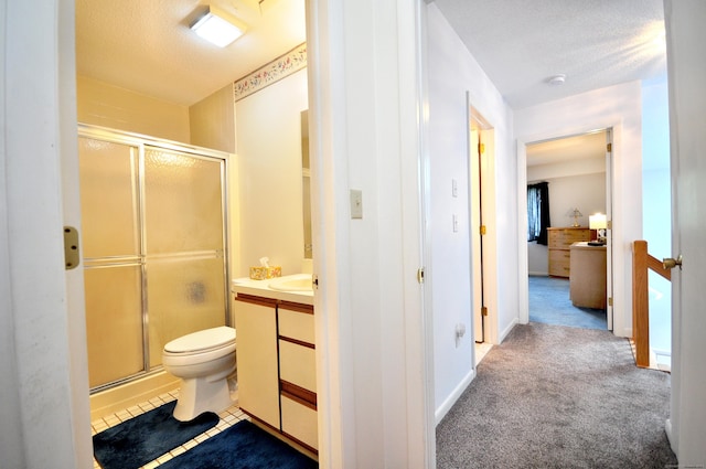443 S Main St Unit 34, Manchester, CT 06040 - bathroom with a stall shower, vanity, toilet, and a textured ceiling