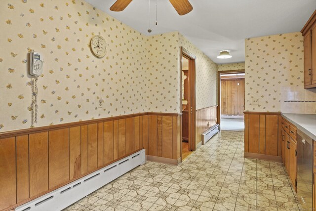 870 N Colony Rd, Meriden, CT 06450 - kitchen featuring a baseboard heating unit, wallpapered walls, light flooring, a wainscoted wall, and a ceiling fan