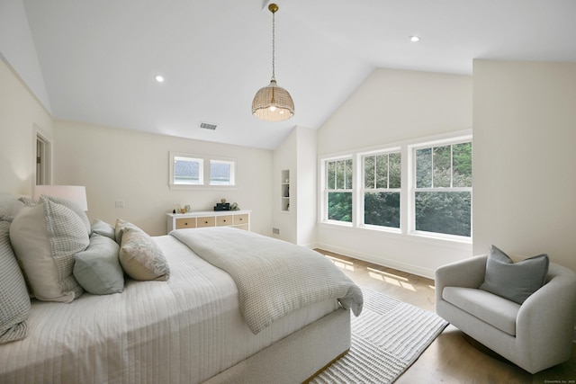 181 Highland Ave, Norwalk, CT 06853 - bedroom featuring high vaulted ceiling, recessed lighting, and wood finished floors