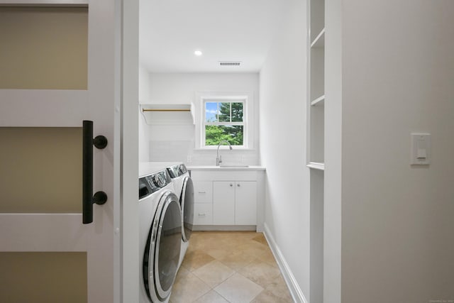 181 Highland Ave, Norwalk, CT 06853 - washroom featuring washer and clothes dryer, light tile patterned floors, recessed lighting, and cabinet space