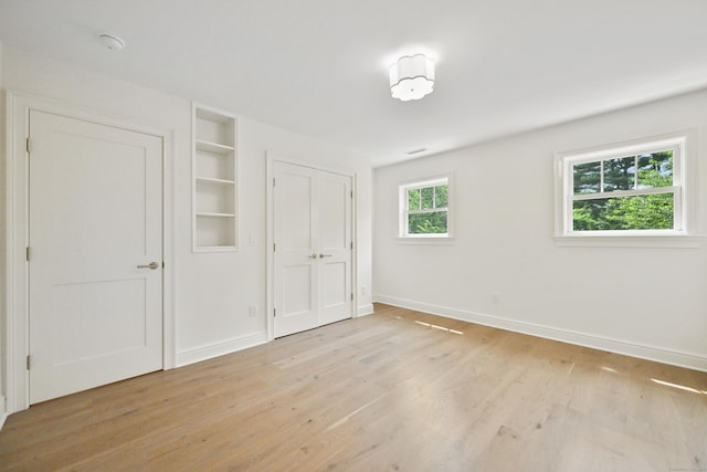 181 Highland Ave, Norwalk, CT 06853 - unfurnished bedroom with light wood-type flooring and baseboards