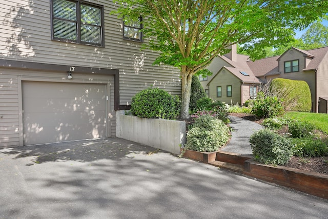 17 Hollow Tree Ln Unit 17, Monroe, CT 06468 - view of front of property featuring a garage and driveway