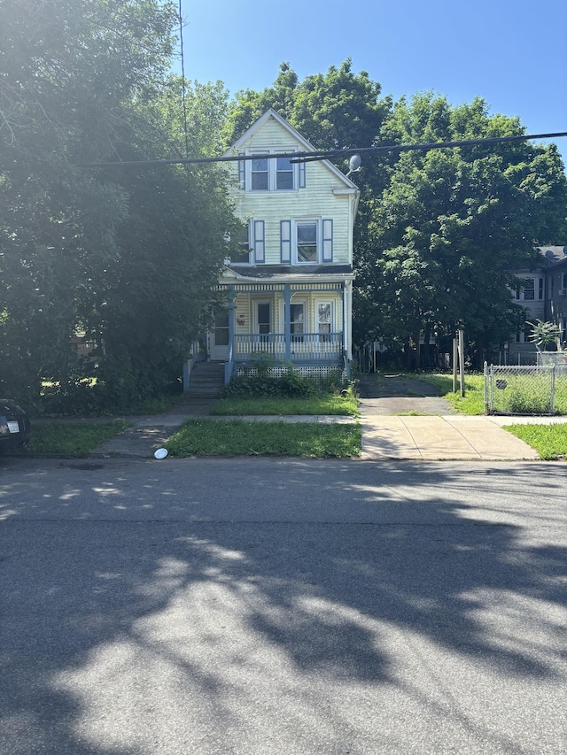 14 Judson Ave, New Haven, CT 06511 - view of front of home featuring a porch and concrete driveway