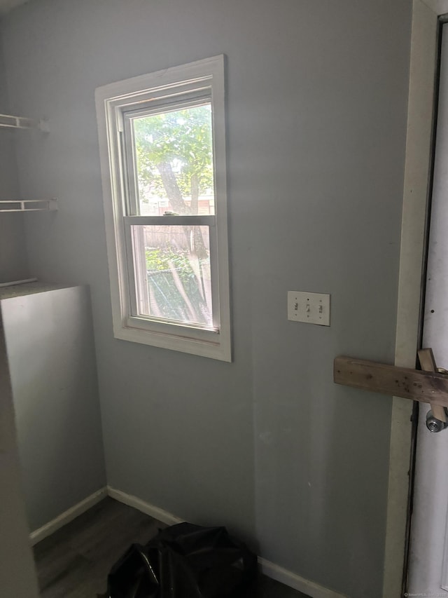 14 Judson Ave, New Haven, CT 06511 - laundry room featuring baseboards and wood finished floors