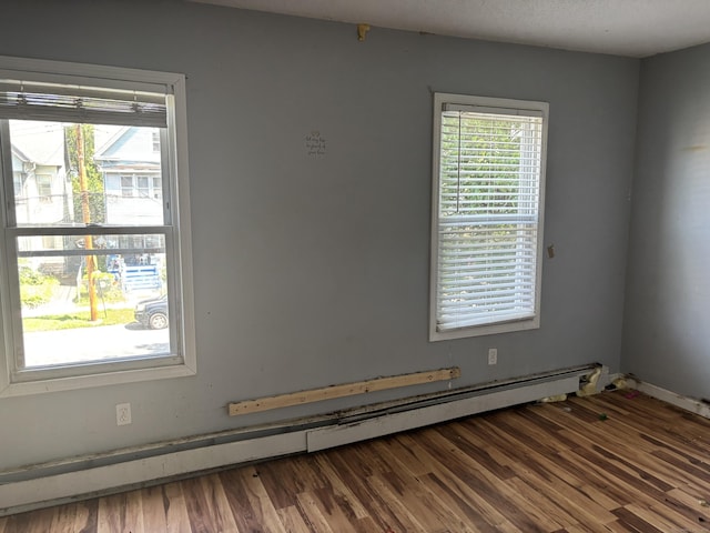14 Judson Ave, New Haven, CT 06511 - unfurnished room with baseboard heating and wood finished floors