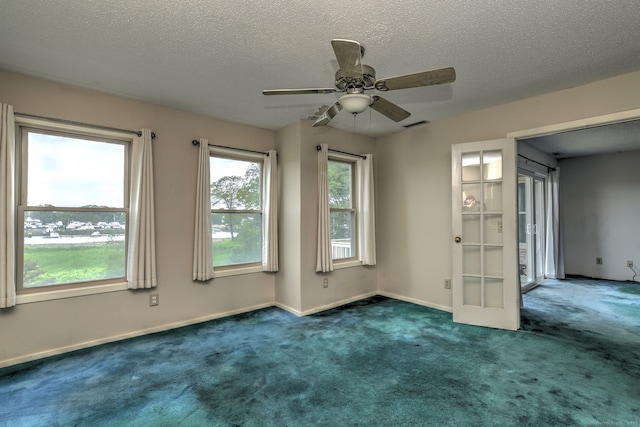 74 Quarry Dock Rd Unit 74, Branford, CT 06405 - empty room featuring carpet flooring, a textured ceiling, french doors, a ceiling fan, and baseboards