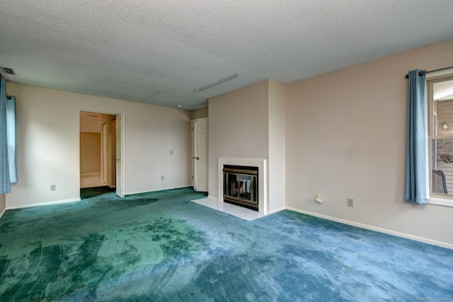74 Quarry Dock Rd Unit 74, Branford, CT 06405 - unfurnished living room featuring a textured ceiling, carpet flooring, baseboards, and a fireplace with flush hearth