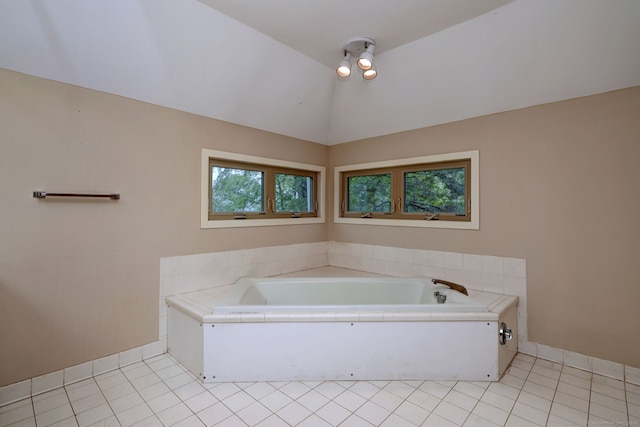 74 Quarry Dock Rd Unit 74, Branford, CT 06405 - full bath featuring tile patterned floors, a bath, baseboards, and vaulted ceiling
