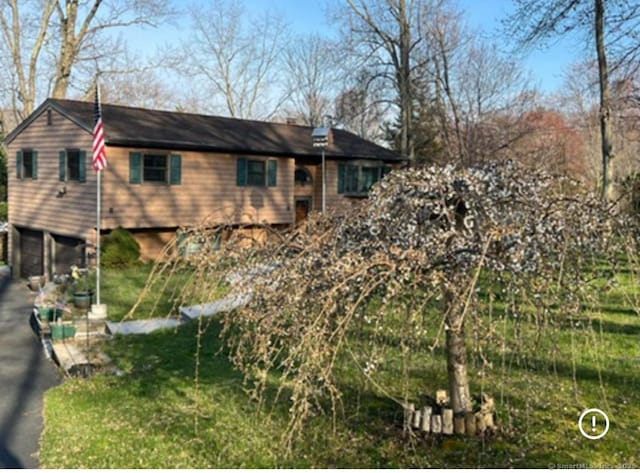 11 Arden Ave, New Fairfield, CT 06812 - view of property exterior featuring driveway and an attached garage