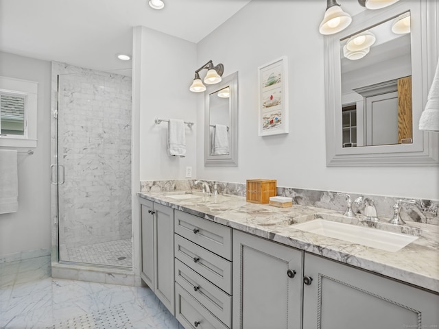 48 Harbor View Ave, Norwalk, CT 06854 - full bath with double vanity, marble finish floors, a shower stall, and recessed lighting